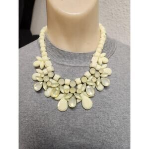 Vintage nude cream bib necklace featuring faceted teardrops and round beaded